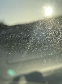 Full frame shot of raindrops on glass