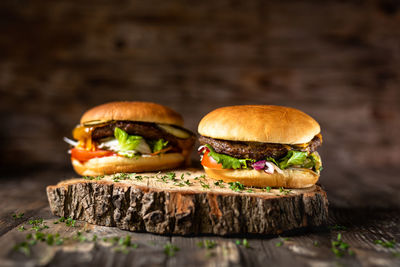 Close-up of burger on wood