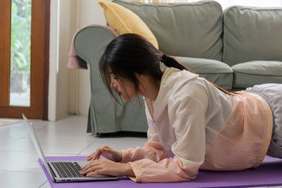 High angle view of mother and daughter at home