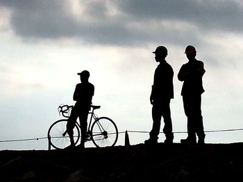 Man riding bicycle on road