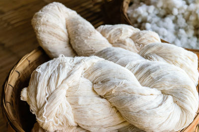 High angle view of bread in basket on table