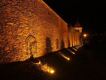 Illuminated street light at night