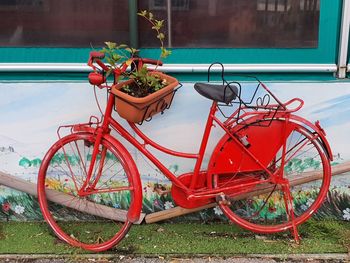 Radiant red vintage bike in nervi, near genoa.