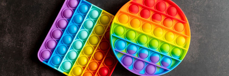 High angle view of multi colored candies on table