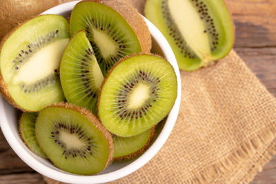 Close-up of kiwi slices in plate