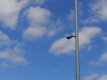 Low angle view of street light against sky