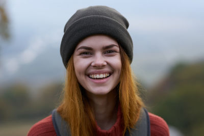 Portrait of smiling young woman