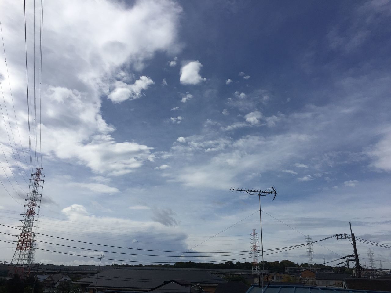 sky, cloud - sky, low angle view, power line, cloudy, electricity pylon, connection, electricity, cable, transportation, cloud, power supply, fuel and power generation, mode of transport, technology, day, outdoors, no people, built structure, mast