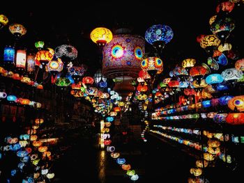 Illuminated lanterns hanging at night