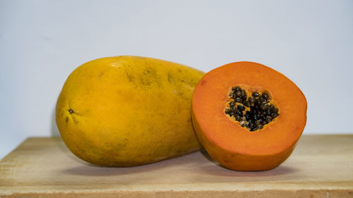 Close-up of orange fruit on table