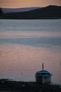 Scenic view of sea against sky at sunset