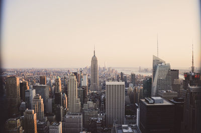 Skyscrapers in city against clear sky