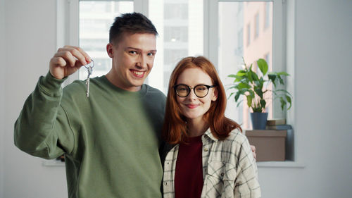 Portrait of smiling young couple