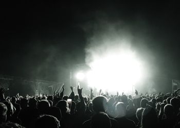 Crowd at music concert at night