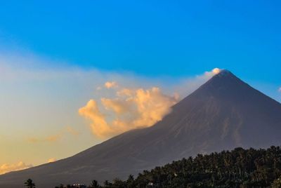 Scenic view of volcanic mountain against sky