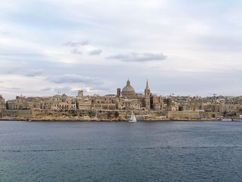 View of river with buildings in background