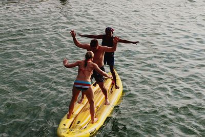 Woman jumping in water