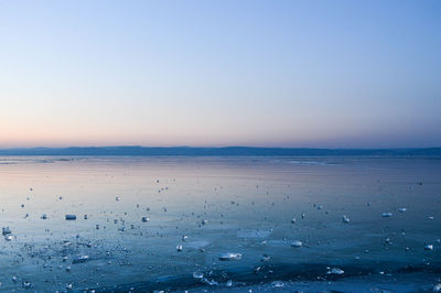 Scenic view of sea against clear sky