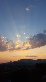 Scenic view of mountains at sunset