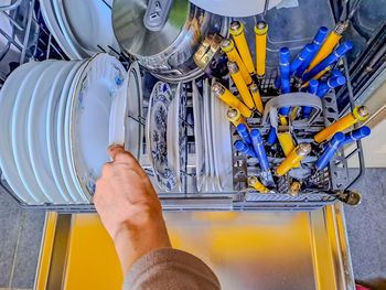 Cropped hand of man working on table