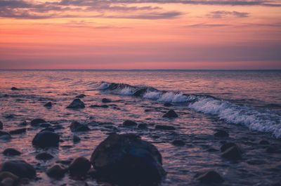 Scenic view of sea against sky during sunset