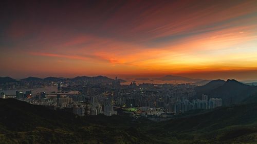 View of cityscape against sky during sunset