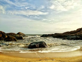 Scenic view of beach against sky