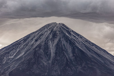 Scenic view of snowcapped mountain against sky