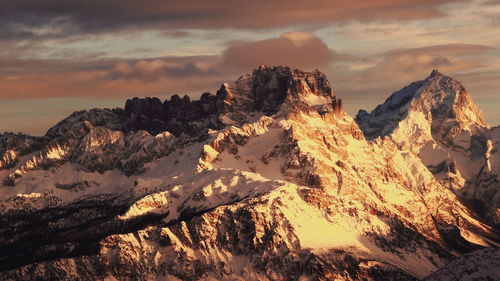 Scenic view of mountains against sky during sunset