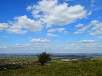 Scenic view of sea against blue sky