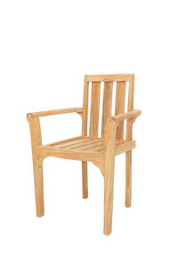 Close-up of wooden chairs against white background