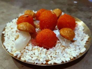 High angle view of breakfast on table, laddu, prasad, indian sweet dish