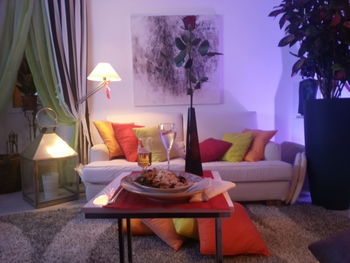 Table and chairs on sofa at home