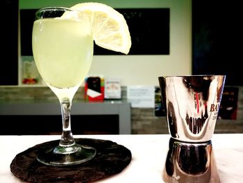 Close-up of beer glass on table