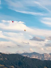 Hot air balloons flying in sky