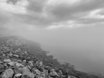 Scenic view of rocks against sky