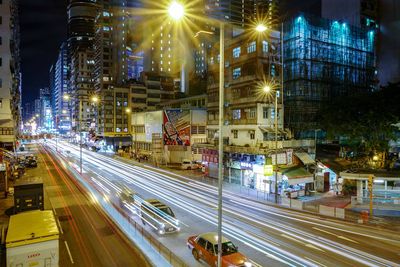 Light trails on city street at night