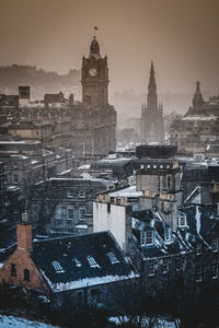 High angle view of buildings in city during winter