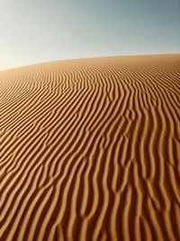 Scenic view of desert against clear sky