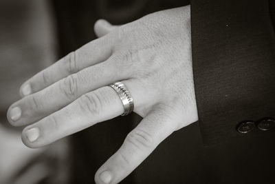 Close-up of hands on table