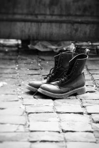 Close-up of shoes on floor