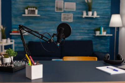 Podcasting microphone on table in studio