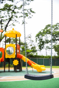 Close-up of swing in playground