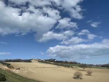 Panoramic view of desert against sky