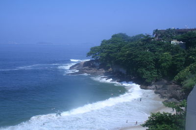 Scenic view of sea against blue sky