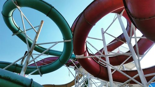 Low angle view of rollercoaster against sky