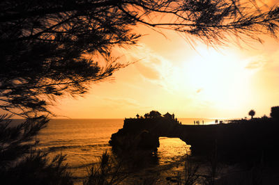 Scenic view of sea at sunset