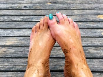 Low section of woman on pier