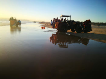 Boat in lake against clear sky