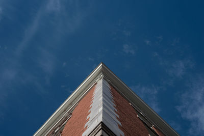 Low angle view of building against blue sky